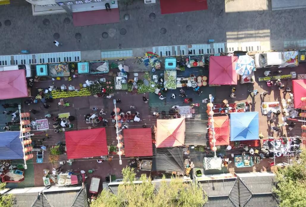 暖暖“烟火气”唤醒城市晨光